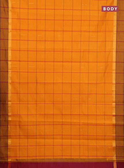 Semi silk cotton saree mustard yellow and maroon with allover thread checks & zari buttas and zari woven simple border
