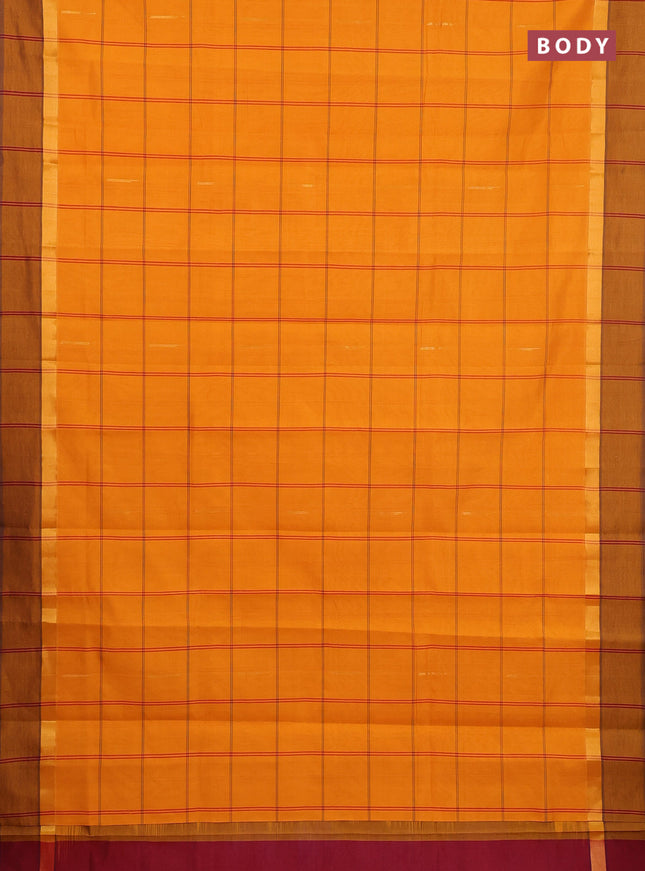Semi silk cotton saree mustard yellow and maroon with allover thread checks & zari buttas and zari woven simple border
