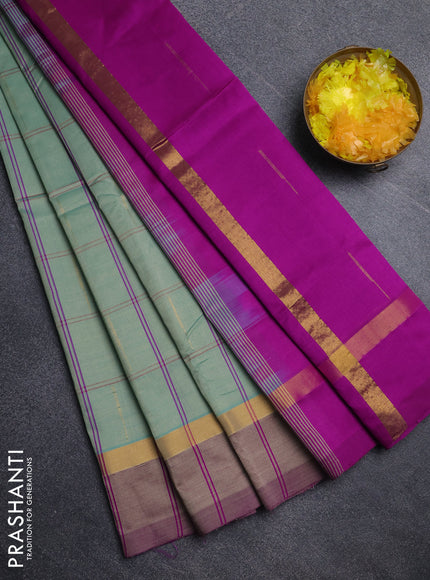 Semi silk cotton saree teal blue and dark pink with allover thread checks & zari buttas and zari woven simple border
