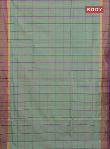 Semi silk cotton saree teal blue and dark pink with allover thread checks & zari buttas and zari woven simple border