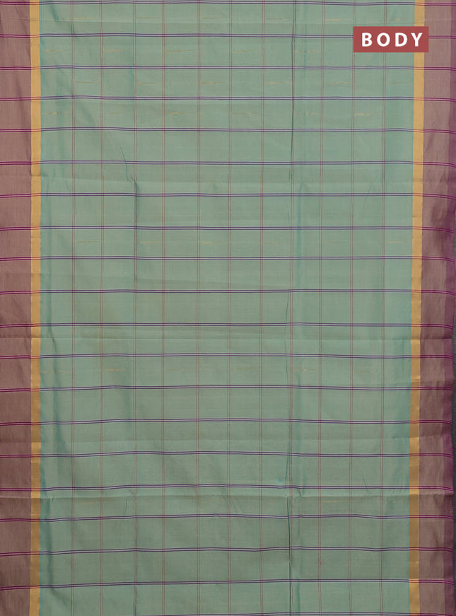 Semi silk cotton saree teal blue and dark pink with allover thread checks & zari buttas and zari woven simple border