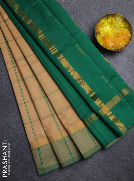 Semi silk cotton saree sandal and green with allover thread checks & zari buttas and zari woven simple border