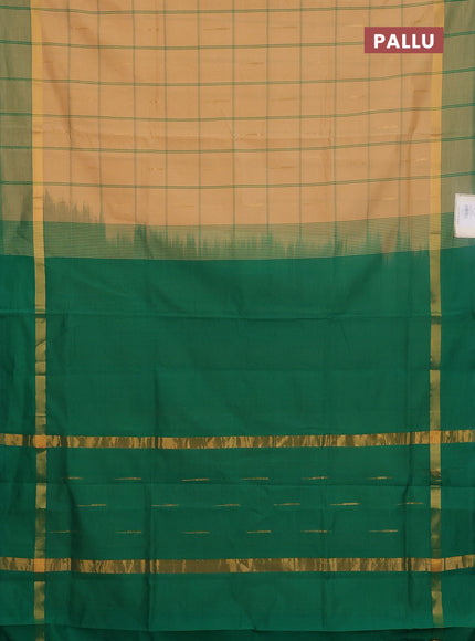 Semi silk cotton saree sandal and green with allover thread checks & zari buttas and zari woven simple border