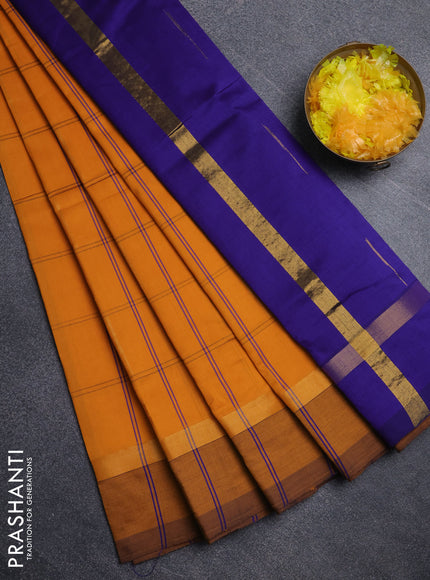 Semi silk cotton saree mustard yellow and blue with allover thread checks & zari buttas and zari woven simple border