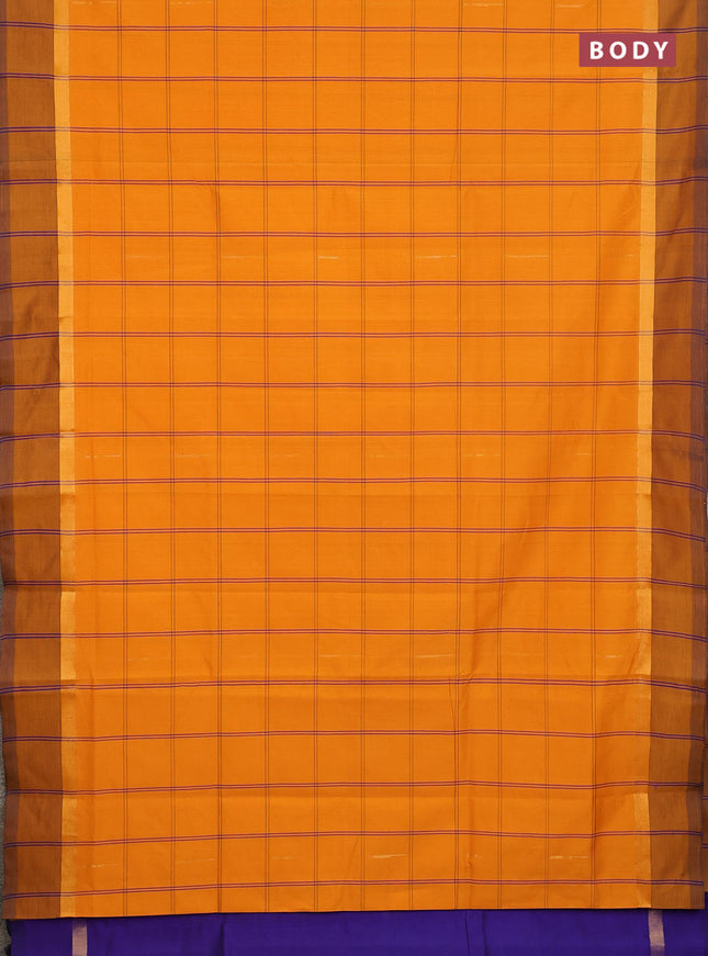 Semi silk cotton saree mustard yellow and blue with allover thread checks & zari buttas and zari woven simple border