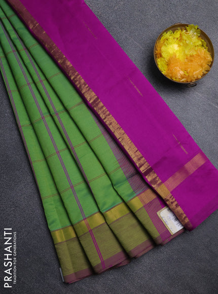 Semi silk cotton saree light green and dark pink with allover thread checks & zari buttas and zari woven simple border