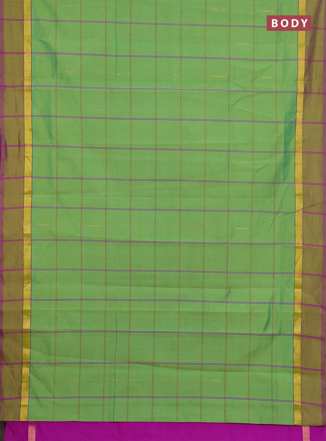 Semi silk cotton saree light green and dark pink with allover thread checks & zari buttas and zari woven simple border