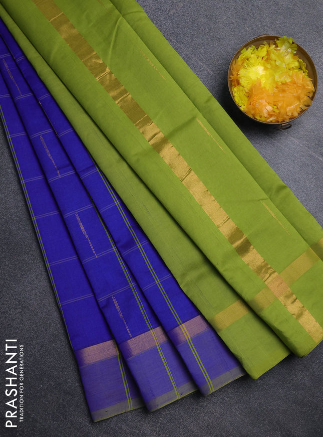Semi silk cotton saree blue and light green with allover thread checks & zari buttas and zari woven simple border
