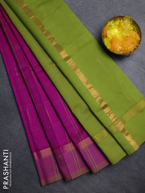 Semi silk cotton saree dark pink and light green with allover thread checks & zari buttas and zari woven simple border