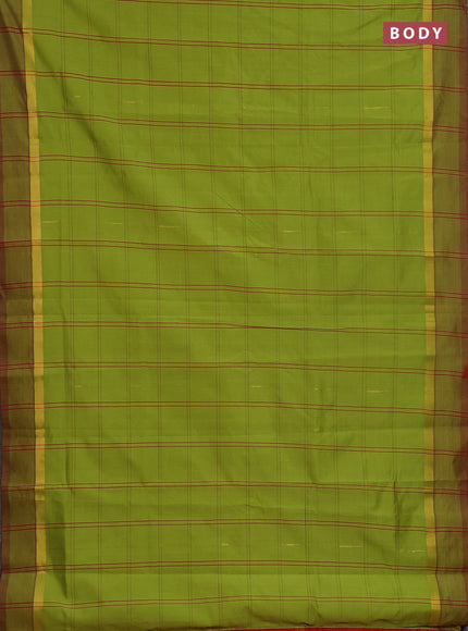Semi silk cotton saree light green and maroon with allover thread checks & zari buttas and zari woven simple border