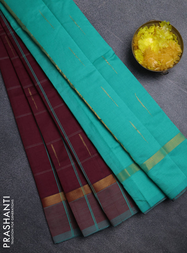 Semi silk cotton saree wine shade and teal green with allover thread checks & zari buttas and zari woven simple border