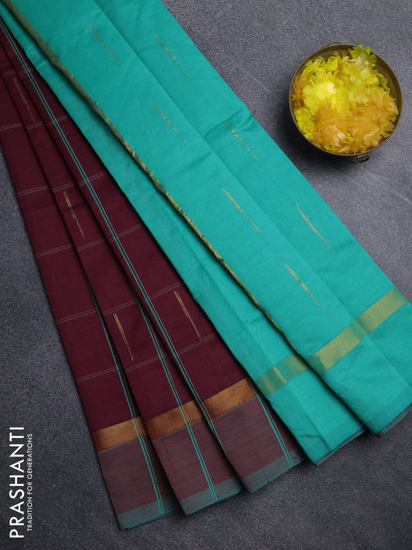 Semi silk cotton saree wine shade and teal green with allover thread checks & zari buttas and zari woven simple border