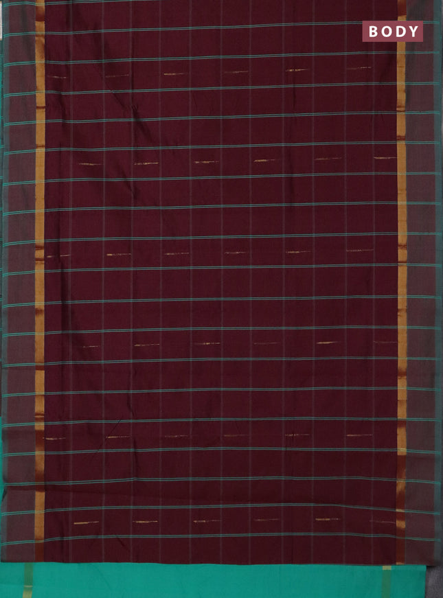 Semi silk cotton saree wine shade and teal green with allover thread checks & zari buttas and zari woven simple border