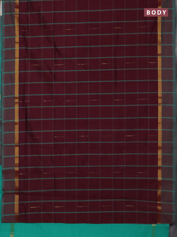Semi silk cotton saree wine shade and teal green with allover thread checks & zari buttas and zari woven simple border