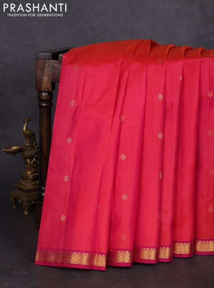 Pure kanchipram silk saree dual shade of pinkish orange and pink with zari woven buttas and small zari woven border