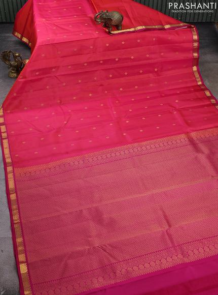 Pure kanchipram silk saree dual shade of pinkish orange and pink with zari woven buttas and small zari woven border