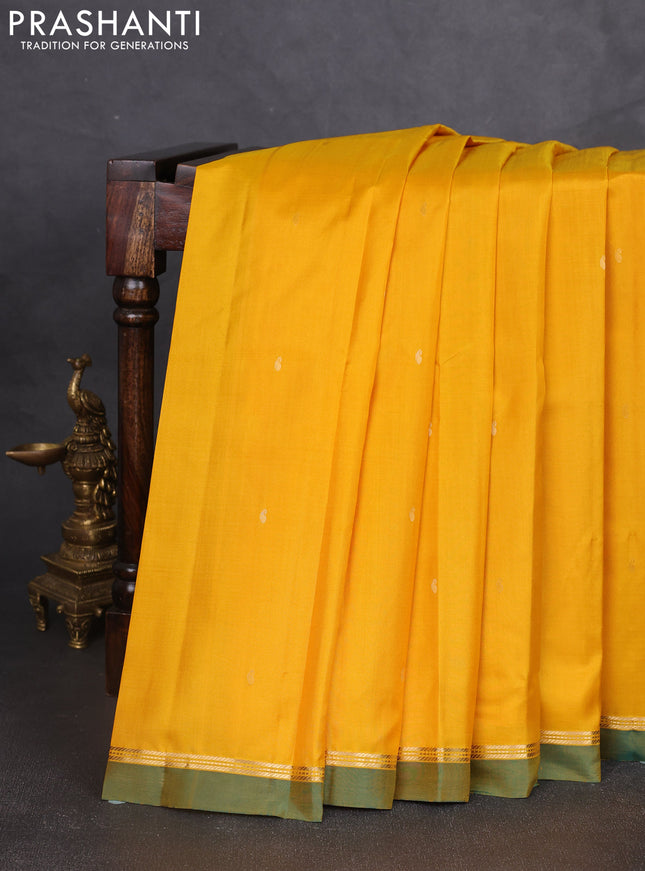 Pure kanchipram silk saree mango yellow and dual shade of green with zari woven buttas and zari woven simple border