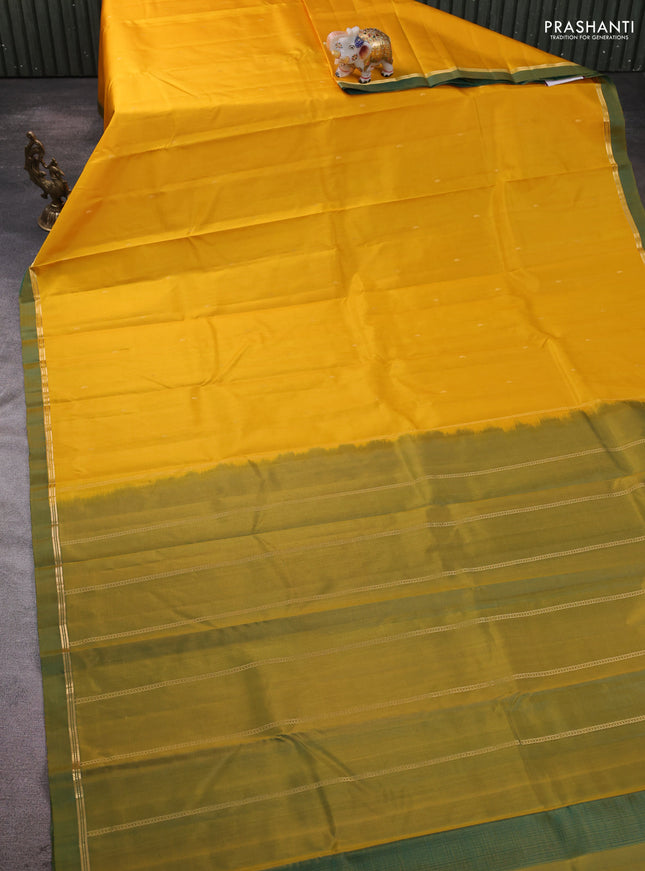 Pure kanchipram silk saree mango yellow and dual shade of green with zari woven buttas and zari woven simple border