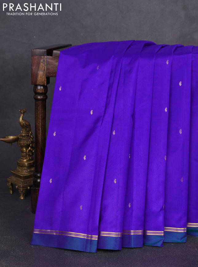 Pure kanchipram silk saree royal blue and peacock green with zari woven buttas and zari woven simple border