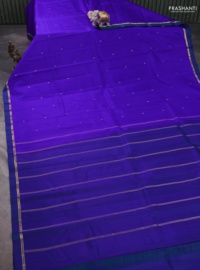 Pure kanchipram silk saree royal blue and peacock green with zari woven buttas and zari woven simple border