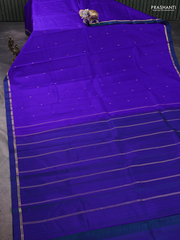 Pure kanchipram silk saree royal blue and peacock green with zari woven buttas and zari woven simple border