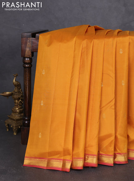 Pure kanchipram silk saree dark mustard and dual shade of pink with zari woven buttas and zari woven border