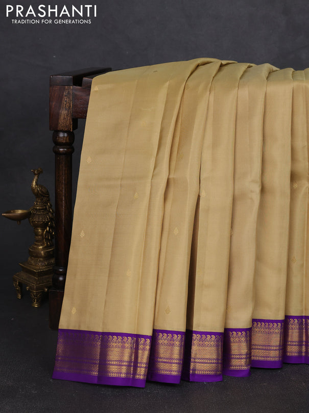 Pure kanchipram silk saree sandal and violet with zari woven buttas and zari woven korvai border