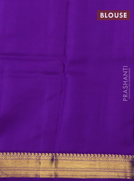Pure kanchipram silk saree sandal and violet with zari woven buttas and zari woven korvai border