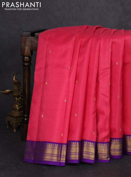 Pure kanchipram silk saree tomato pink and violet with zari woven buttas and zari woven korvai border