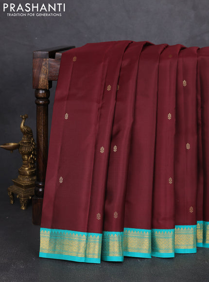 Pure kanchipram silk saree deep maroon and teal green with zari woven buttas and zari woven korvai border