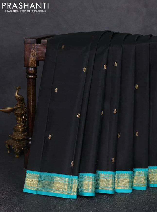 Pure kanchipram silk saree black and teal green with zari woven buttas and zari woven korvai border