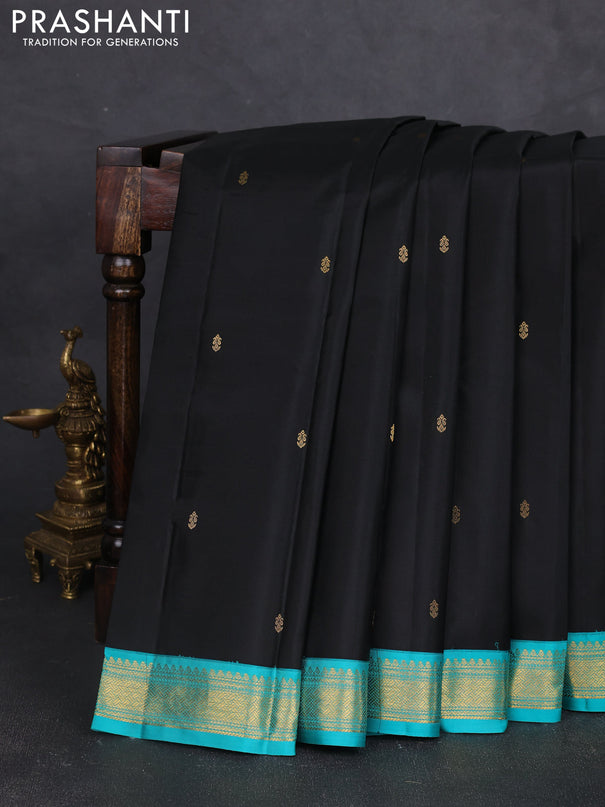 Pure kanchipram silk saree black and teal green with zari woven buttas and zari woven korvai border