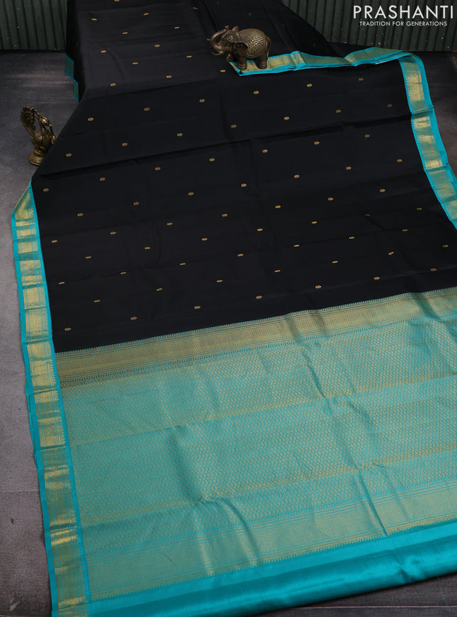 Pure kanchipram silk saree black and teal green with zari woven buttas and zari woven korvai border