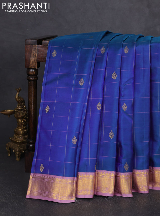 Pure kanchipram silk saree blue shade and lavender with allover thread checks & buttas and zari woven korvai border