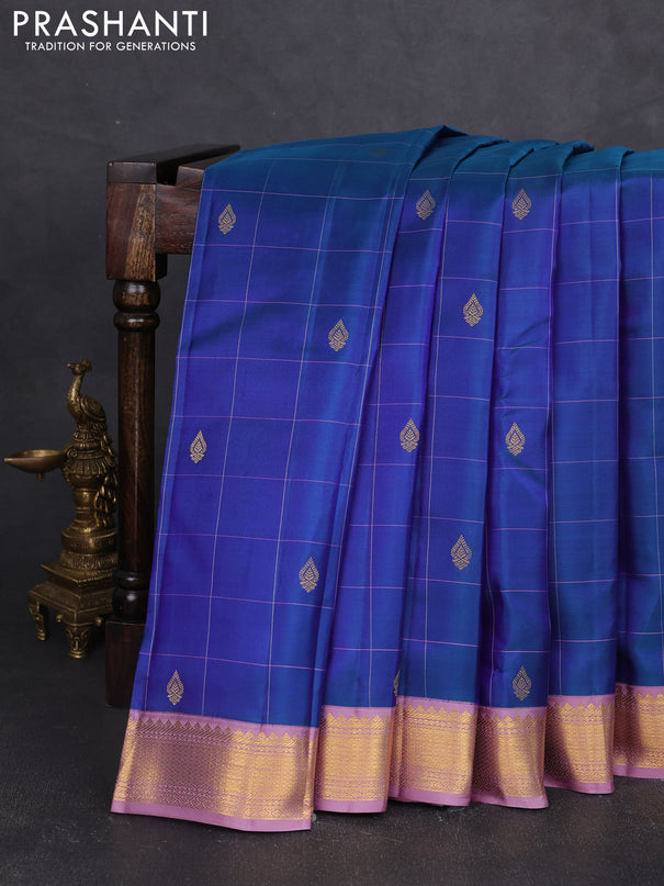 Pure kanchipram silk saree blue shade and lavender with allover thread checks & buttas and zari woven korvai border