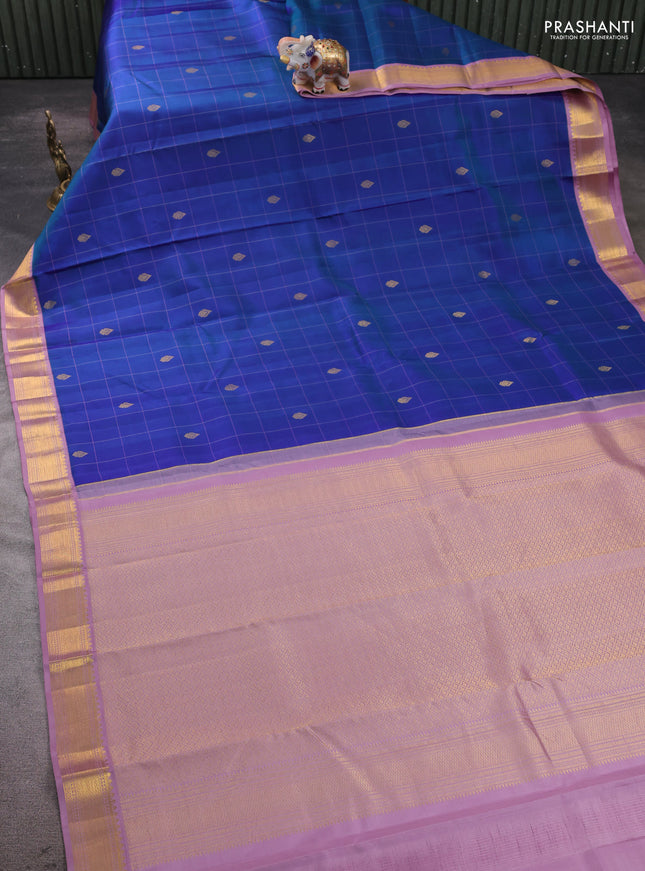 Pure kanchipram silk saree blue shade and lavender with allover thread checks & buttas and zari woven korvai border