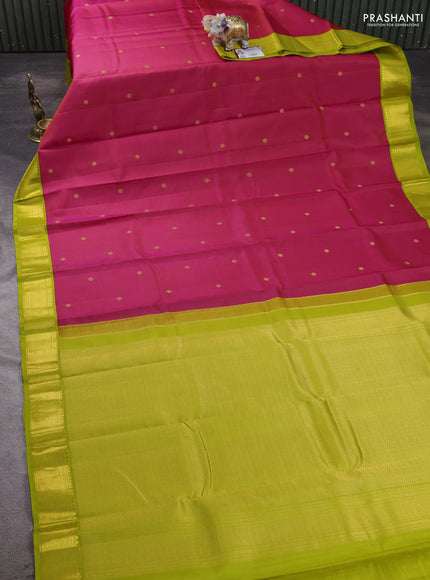 Pure kanchipram silk saree tomato pionk and light green with zari woven buttas and zari woven korvai border
