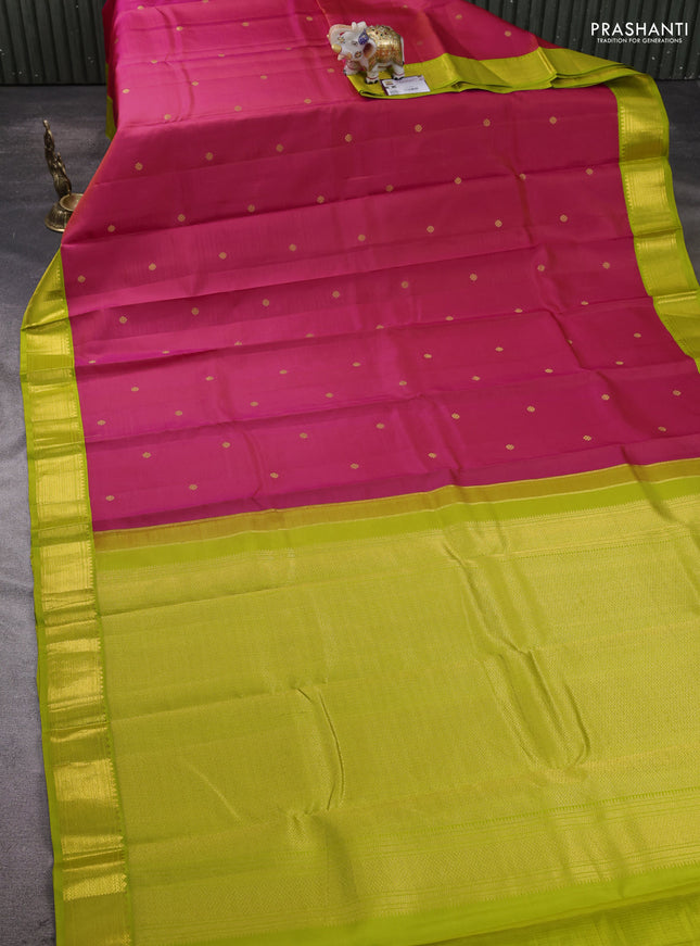 Pure kanchipram silk saree tomato pionk and light green with zari woven buttas and zari woven korvai border