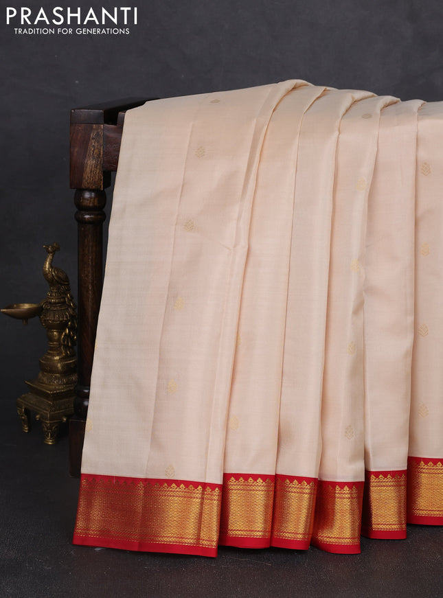 Pure kanchipram silk saree cream and red with zari woven buttas and zari woven korvai border