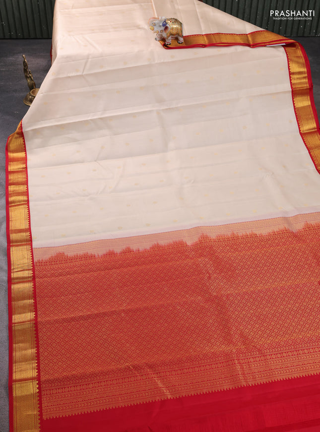 Pure kanchipram silk saree cream and red with zari woven buttas and zari woven korvai border