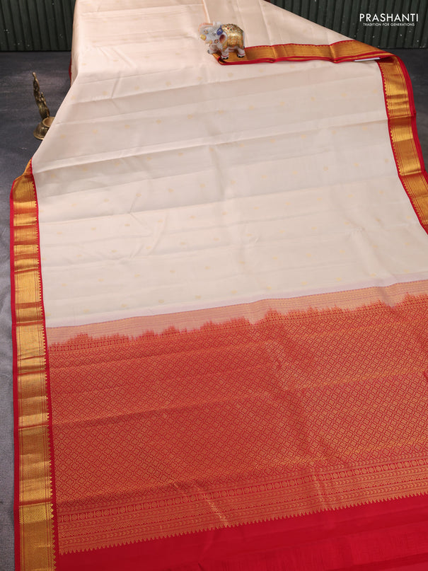 Pure kanchipram silk saree cream and red with zari woven buttas and zari woven korvai border