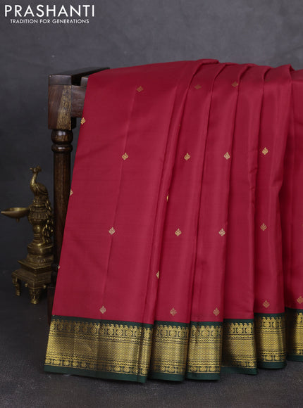 Pure kanchipram silk saree red and bottle green with zari woven buttas and zari woven korvai border