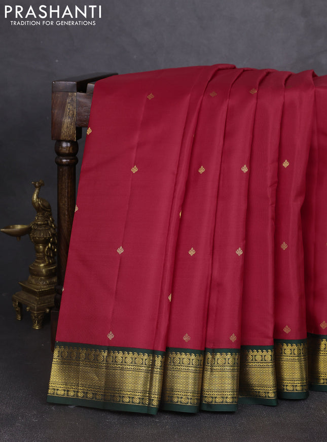 Pure kanchipram silk saree red and bottle green with zari woven buttas and zari woven korvai border