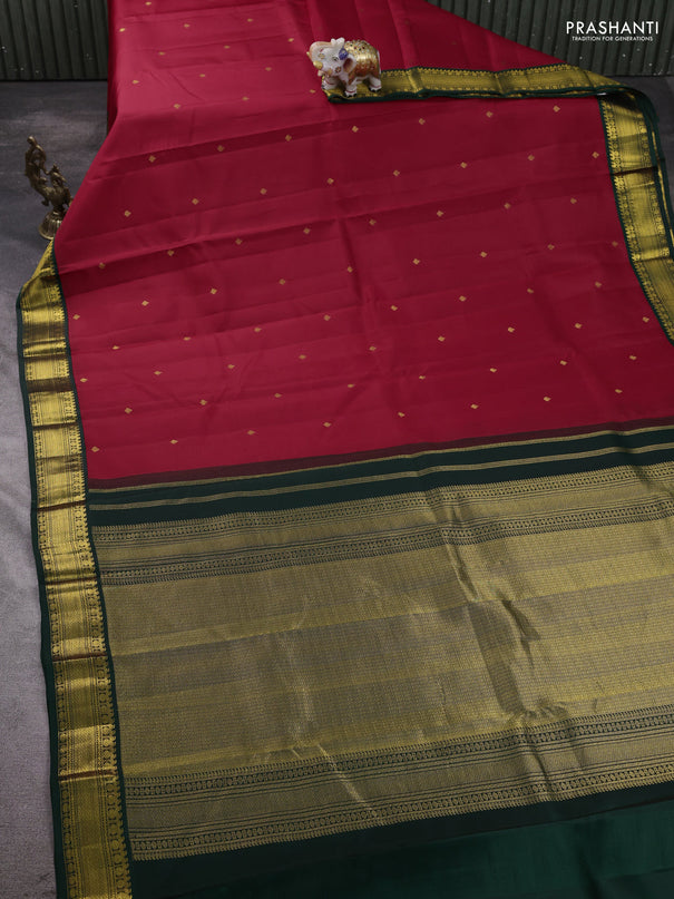 Pure kanchipram silk saree red and bottle green with zari woven buttas and zari woven korvai border