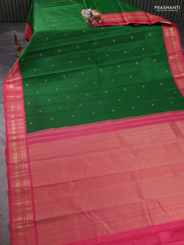 Pure kanchipram silk saree green and peach pink with zari woven buttas and zari woven korvai border