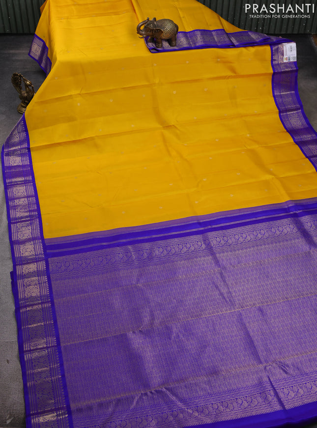 Pure kanchipram silk saree yellow and royal blue with zari woven buttas and zari woven korvai border