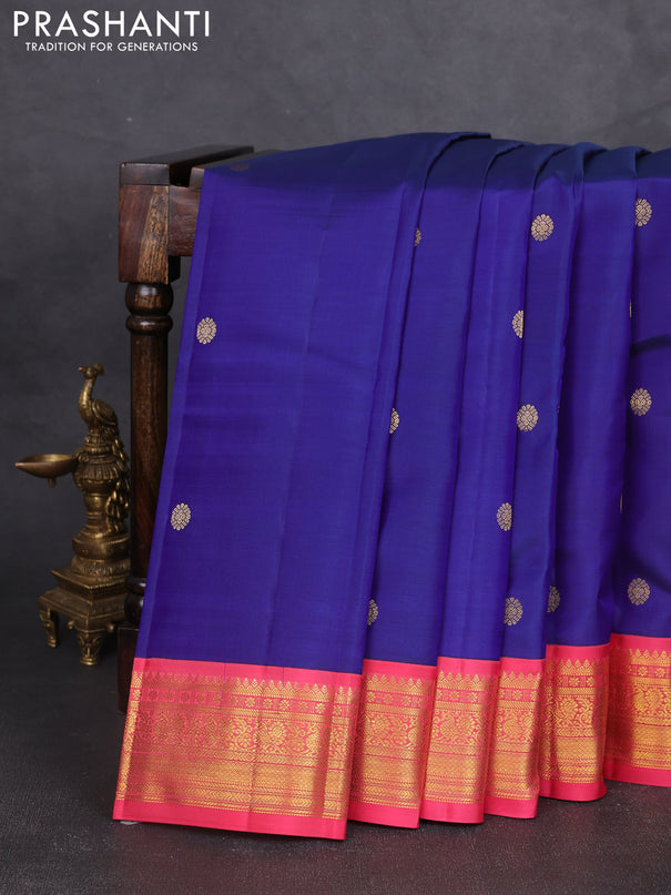Pure kanchipram silk saree blue and peach pink with zari woven buttas and zari woven korvai border