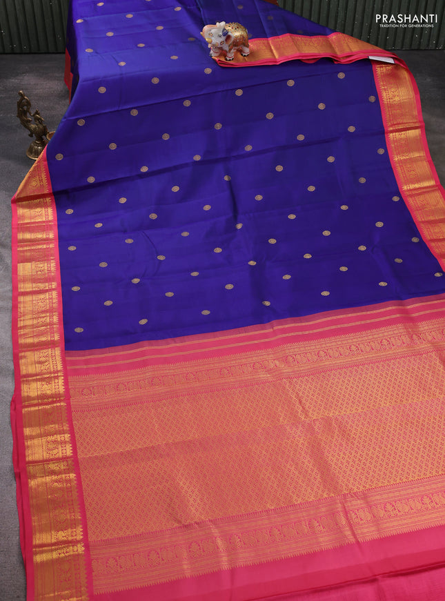 Pure kanchipram silk saree blue and peach pink with zari woven buttas and zari woven korvai border