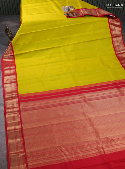 Pure kanchipram silk saree lime green and red with zari woven buttas and zari woven korvai border