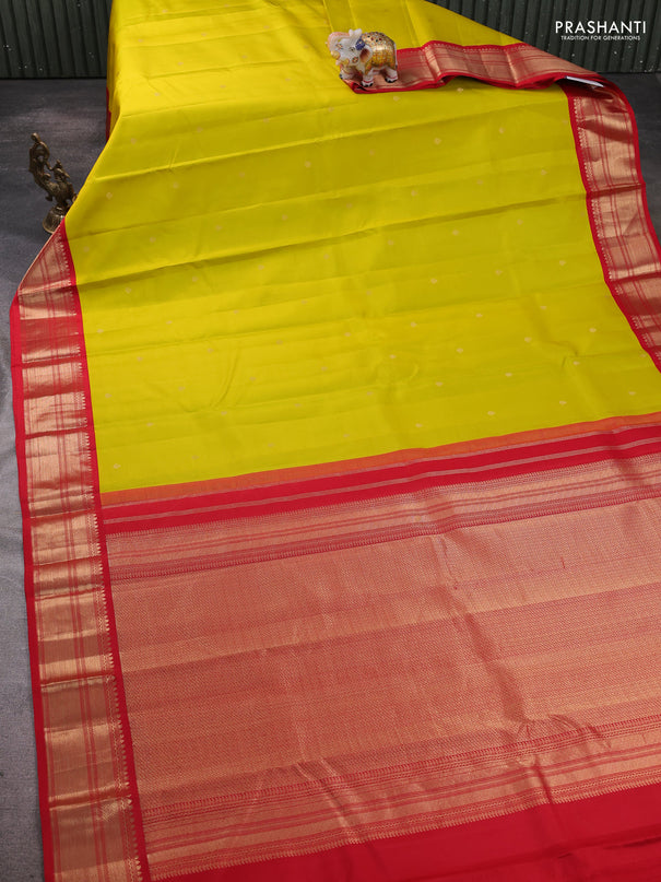 Pure kanchipram silk saree lime green and red with zari woven buttas and zari woven korvai border